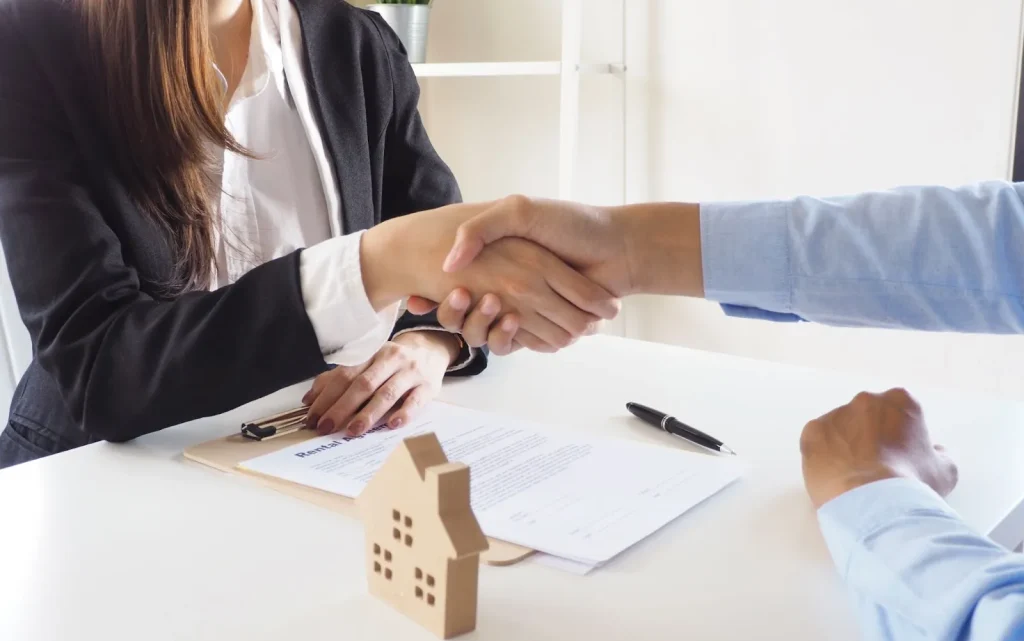 Someone is receiving the keys to a new house.